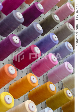 Many spools of thread of different colors Many spools of thread of different colors 135187452
