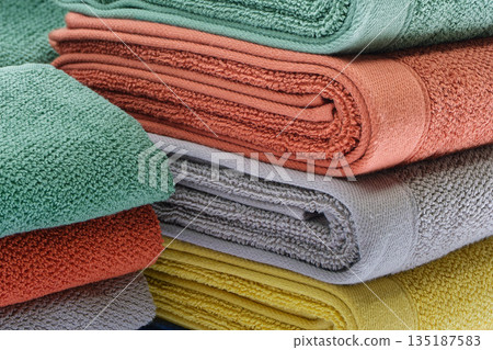 Terry towels or bedspreads of various colors 135187583