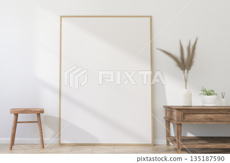 Thin Vertical Wooden Frame Mockup with Minimalist Design on Light Wall. 3D render. Thin Vertical Wooden Frame Mockup with Minimalist Design on Light Wall. 3D render. 135187590