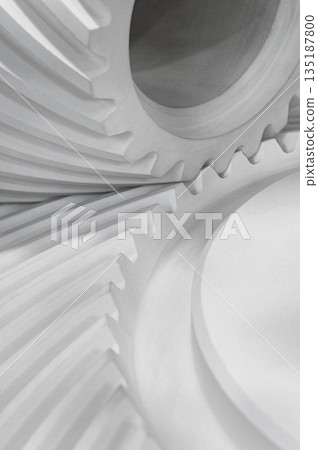 Two white bevel gears, part of crossed gear transmission 135187800