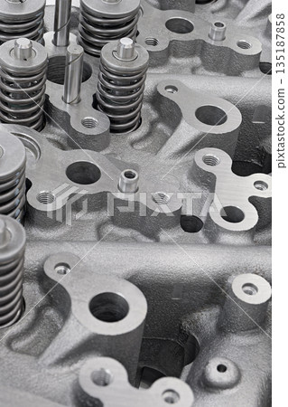 Cylinder head of an internal combustion engine with the cover removed Cylinder head of an internal combustion engine with the cover removed 135187858