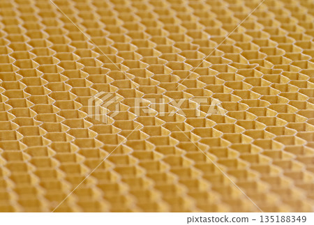 Hollow cells of honeycomb structure made of fiberglass or another composite material Hollow cells of honeycomb structure made of fiberglass or another composite material 135188349