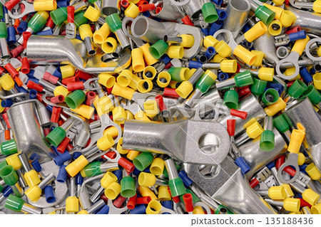 A lot of electrical terminals, connectors and tips of various shapes, sizes and colors 135188436