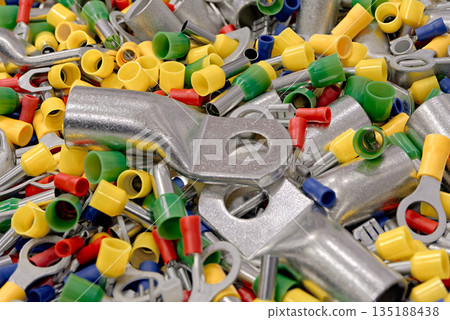 A lot of electrical terminals, connectors and tips of various shapes, sizes and colors A lot of electrical terminals, connectors and tips of various shapes, sizes and colors 135188438