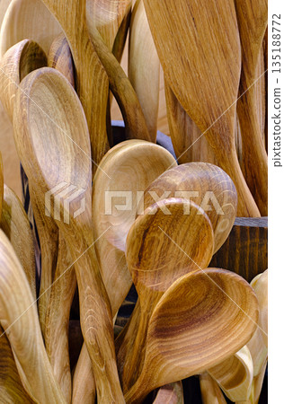A large group of handmade wooden spoons A large group of handmade wooden spoons 135188772