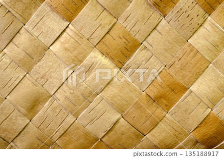 Wattled pattern made of birch bark Wattled pattern made of birch bark 135188917