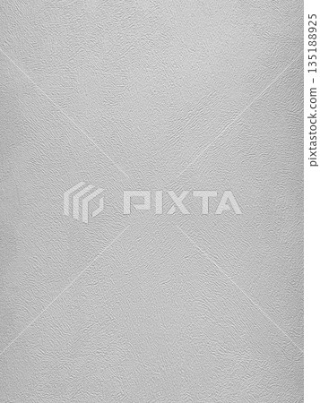 Textured white plaster wall surface close-up. Detailed view of rough white textured wall with wave-like patterns and shadows 135188925