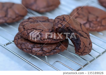 Freshly Baked Brownie Cookies with Cracked Surface and Fudgy Center 135189026