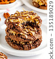 German Chocolate Cookies with Coconut, Pecans, and Drizzled Chocolate 135189029