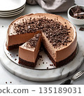 Chocolate Mousse Cake with Shaved Chocolate Topping and Brownie Base 135189031
