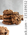 Chocolate Oatmeal Cookies with Chopped Nuts and Chocolate Chips 135189032
