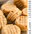 Peanut Butter Sandwich Cookies with Creamy Filling and Texture 135189038