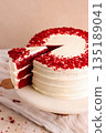Red Velvet Cake with Cream Cheese Frosting and Slice Cut 135189041