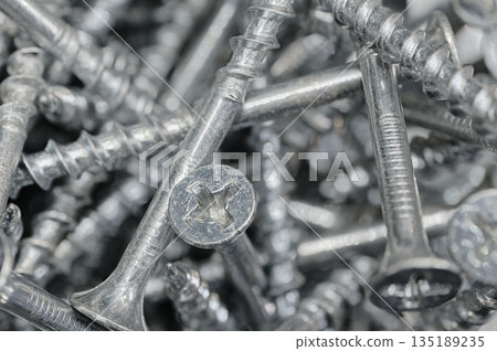 A lot of galvanized screws 135189235