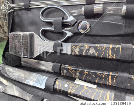 Essential grilling tools for a perfect cookout on a sunny day 135189459