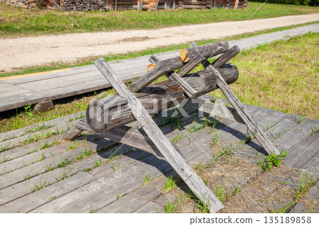 Wooden Sawhorses Near Traditional Village House 135189858