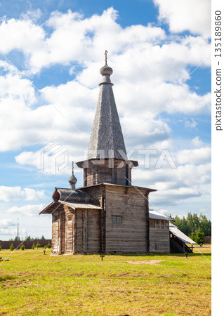 Wooden Church with Spire and Cross 135189860