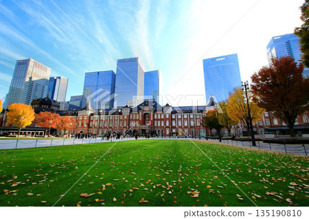 The central station illuminated by the autumn morning sun... The beautiful red brick station building "Tokyo Station" 135190810