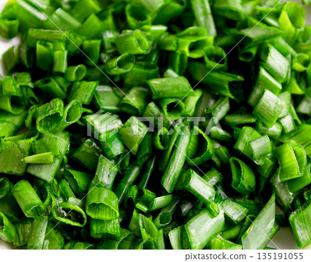 Freshly chopped green onions top view 135191055