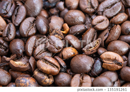 Coffee beans closeup, Light roast beans detailed view, Closeup of lightly roasted coffee beans with variations, Micro shot of light roasted beans highlighting color and texture 135191261