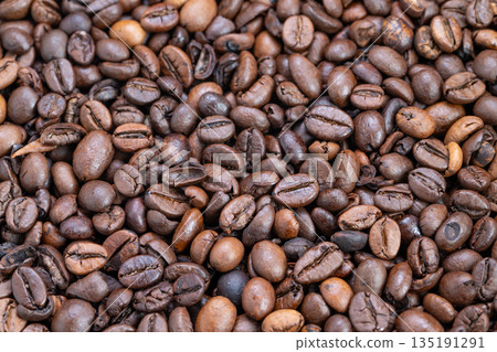 Unique coffee bean imagery, Sustainable sourced coffee highlighting natural hues and textures, Artistic depiction of origin through diverse coffee bean shades and finishes 135191291