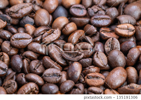 Beans for relaxing coffee moments, Aromatic coffee beans symbolize comfort during busy days, Premium coffee beans provide cozy aroma perfect for daily rituals and routines 135191306
