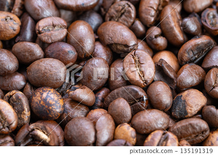 Warm coffee scene, Rich roasted beans with earthy notes, Subtle surface sheen highlights origin and aroma, Cozy lighting emphasizes artisanal craftsmanship and morning tradition Warm coffee scene, Rich roasted beans with earthy notes, Subtle surface sheen highlights origin and aroma, Cozy lighting emphasizes artisanal craftsmanship and morning tradition 135191319