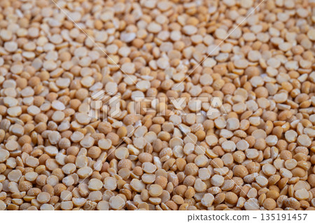 Highquality imagery of peas emphasizing surface details and purity, Closeup photo showcasing individual yellow peas with surface features and possible impurities Highquality imagery of peas emphasizing surface details and purity, Closeup photo showcasing individual yellow peas with surface features and possible impurities 135191457