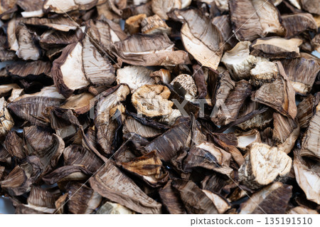 Close up dried mushrooms natural background texture neutral earthy palette forms repeating organic pattern suitable for design overlays, packaging, and eco branding backdrops Close up dried mushrooms natural background texture neutral earthy palette forms repeating organic pattern suitable for design overlays, packaging, and eco branding backdrops 135191510