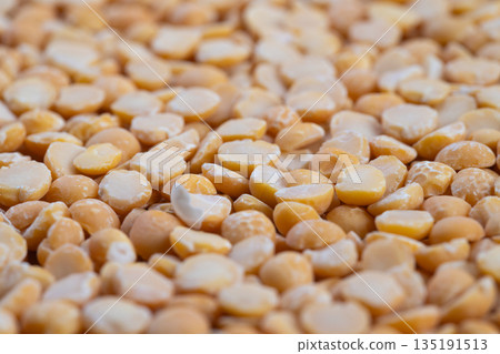 Macro abstract yellow pea texture, decorative backdrop with shallow depth of field for creative projects, pattern study useful for packaging, web and editorial design use 135191513