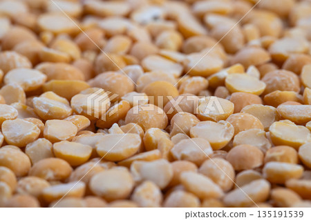 Macro pattern yellow split peas abstract, artistic minimalism with repeating organic shapes and warm palette, highresolution texture ideal for backgrounds and design projects Macro pattern yellow split peas abstract, artistic minimalism with repeating organic shapes and warm palette, highresolution texture ideal for backgrounds and design projects 135191539