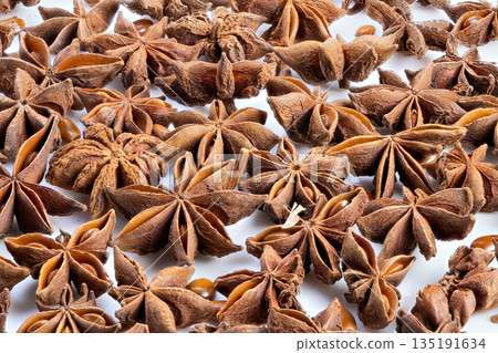 Rustic herbal tea component display, Closeup of dried anise seeds showcased, Rustic apothecary style photograph emphasizing calming herbal tea components with earthy aroma Rustic herbal tea component display, Closeup of dried anise seeds showcased, Rustic apothecary style photograph emphasizing calming herbal tea components with earthy aroma 135191634