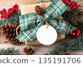Blank round Christmas gift tag mockup with present box Blank round Christmas gift tag mockup with present box 135191706