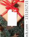 Christmas rectangle gift tag mockup with present box top view Christmas rectangle gift tag mockup with present box top view 135191715