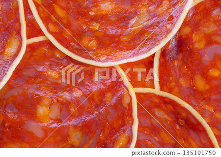 Circular chorizo arrangement highlights textures and appeal, Artistic flat arrangement of chorizo slices emphasizing marbling and cheese details for promotional use Circular chorizo arrangement highlights textures and appeal, Artistic flat arrangement of chorizo slices emphasizing marbling and cheese details for promotional use 135191750