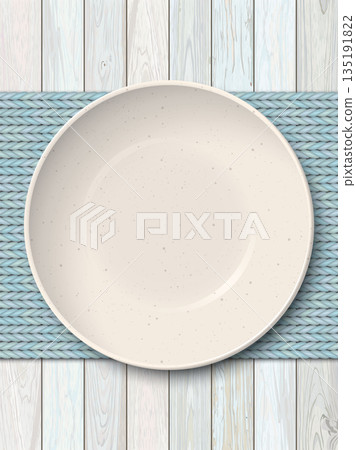 Top view of empty ivory bowl with with grainy texture placed on a light blue placemat on cut timber panel vertical background 135191822