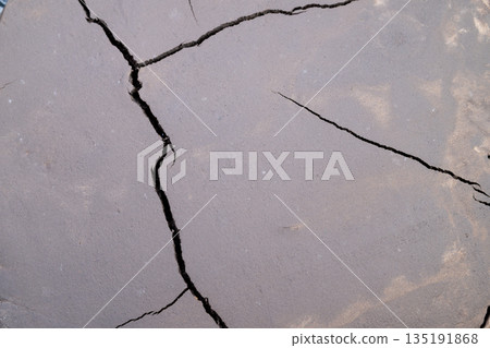 Fractal soil crack design, Complex fractal pattern of cracked earth for backgrounds, Detailed mosaic of intersecting fissures and granular textures on soil surface Fractal soil crack design, Complex fractal pattern of cracked earth for backgrounds, Detailed mosaic of intersecting fissures and granular textures on soil surface 135191868