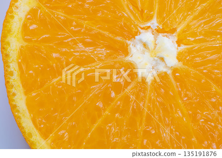 Orange segments prepared with natural oil droplets and shiny membranes, Ready orange slices with glossy membranes and droplets for fresh juice extraction process 135191876