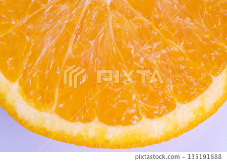 Fresh breakfast orange slice with juicy flesh and bright rind, appetizing composition for morning meal and wellness content, conveys vitality and wholesome start of day Fresh breakfast orange slice with juicy flesh and bright rind, appetizing composition for morning meal and wellness content, conveys vitality and wholesome start of day 135191888