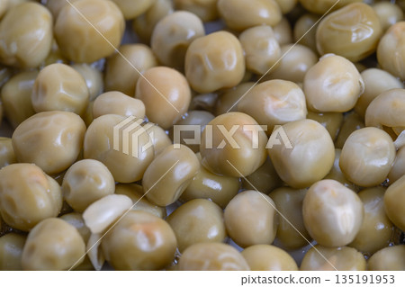 Mockup illustrating uniform canned pea packaging design, Highresolution image showcasing consistent shapes and appealing texture of canned peas for promotional materials 135191953
