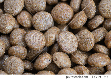 Eco focused kibble texture with traceable grains, earthy pellet tones and rustic appearance, farmtobowl storytelling for sustainability messaging and green packaging concepts Eco focused kibble texture with traceable grains, earthy pellet tones and rustic appearance, farmtobowl storytelling for sustainability messaging and green packaging concepts 135191954
