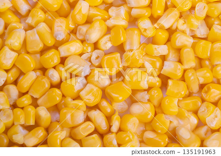 Shining yellow kernels macro view, Detailed image of golden corn kernels up close, Zoomedin view showcasing vibrant yellow corn with shiny kernels clearly visible Shining yellow kernels macro view, Detailed image of golden corn kernels up close, Zoomedin view showcasing vibrant yellow corn with shiny kernels clearly visible 135191963