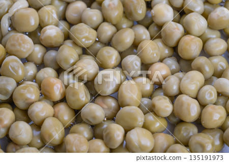 Peas for meal prep, Canned peas add protein richness, Brightly colored peas for healthy meals, Visible textured peas served conveniently for nutritious preparations Peas for meal prep, Canned peas add protein richness, Brightly colored peas for healthy meals, Visible textured peas served conveniently for nutritious preparations 135191973