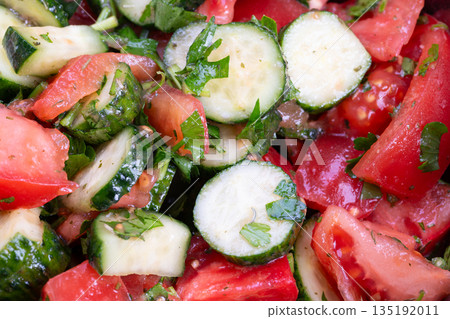 Morning sunlight highlights rustic farm produce and crisp vegetables, Wooden bowl filled with ripe heirloom tomatoes and crunchy cucumbers captures farm to table essence Morning sunlight highlights rustic farm produce and crisp vegetables, Wooden bowl filled with ripe heirloom tomatoes and crunchy cucumbers captures farm to table essence 135192011