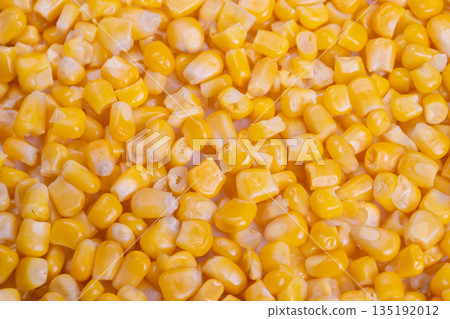 Chef organizes colorful corn and ingredients on workspace for cooking, Kitchen environment showing neatly arranged corn and ingredients for culinary presentation Chef organizes colorful corn and ingredients on workspace for cooking, Kitchen environment showing neatly arranged corn and ingredients for culinary presentation 135192012