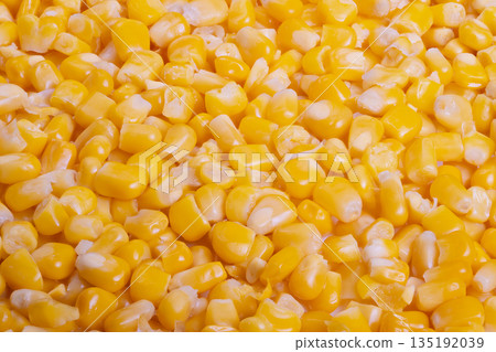 Colorful corn side, Bright yellow corn pieces, Vivid yellow corn kernels serve as familiar dish accompaniment, Sweet corn morsels provide versatile and inviting side dish option 135192039