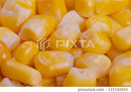 Vivid yellow corn kernels with natural shine and texture highlight, Colorful maize seeds exhibiting smooth surfaces and detailed grain structure for food industry use Vivid yellow corn kernels with natural shine and texture highlight, Colorful maize seeds exhibiting smooth surfaces and detailed grain structure for food industry use 135192043