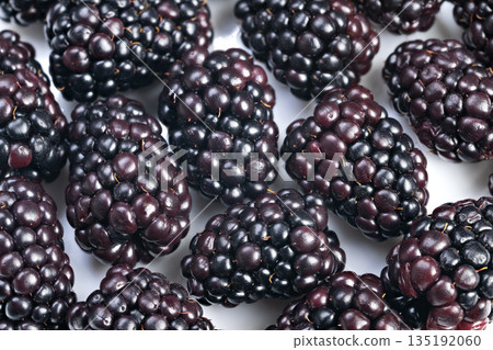 Studio image showcasing ripe blackberries for marketing purposes, Highdetail product photograph capturing shiny blackberries ideal for promotional and packaging use Studio image showcasing ripe blackberries for marketing purposes, Highdetail product photograph capturing shiny blackberries ideal for promotional and packaging use 135192060
