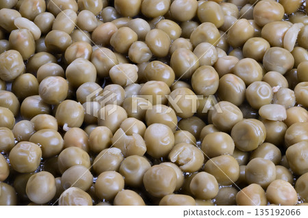 Comfort food with nostalgic appeal, Vintage styled peas evoke warm comforting feelings, Oldfashioned style canned peas bring back cherished memories and cozy dinner moments 135192066