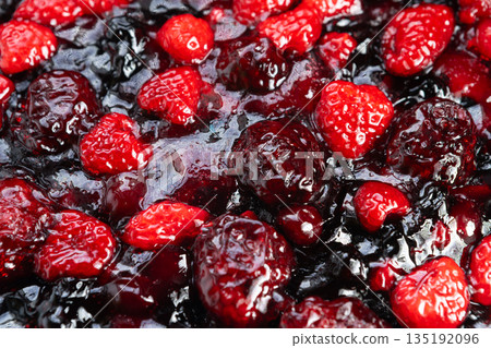 Festive berry glaze, Seasonal elegance showcased by sparkling berry and fruit coating, Joyous berry glaze radiates with vibrant colors and luxurious charm during festivities Festive berry glaze, Seasonal elegance showcased by sparkling berry and fruit coating, Joyous berry glaze radiates with vibrant colors and luxurious charm during festivities 135192096